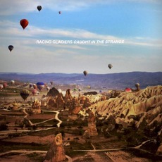 Caught in the Strange (Deluxe Edition) mp3 Album by Racing Glaciers